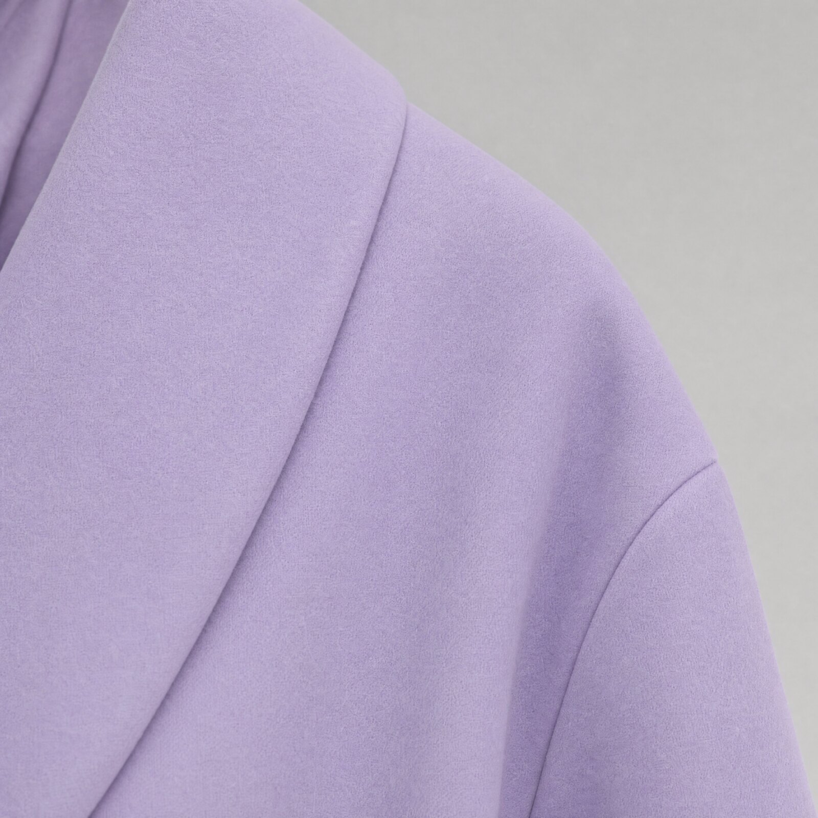 The collar meeting the dropped shoulder